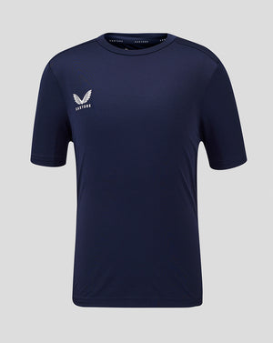 Front view of navy Junior Performance Tee with white Castore logo on the left chest.