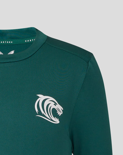 Close-up of neck and shoulder on green Botanical Leicester Tigers junior training T-shirt with Castore branding