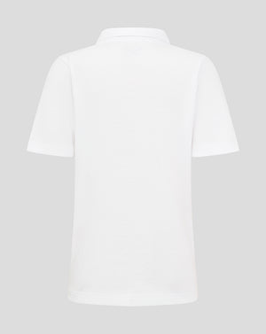 Back view of white Junior Cotton Leisure Polo with short sleeves and classic collar