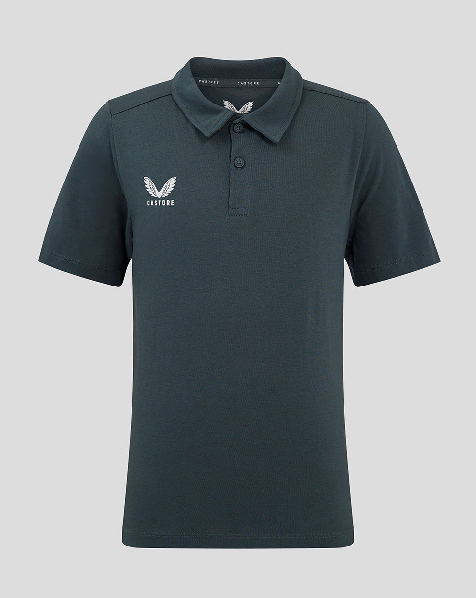 Front view of dark slate junior polo shirt with a white winged crest on the chest