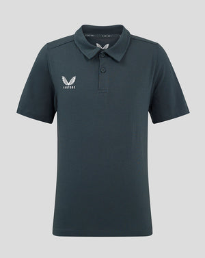 Front view of dark slate junior polo shirt with a white winged crest on the chest