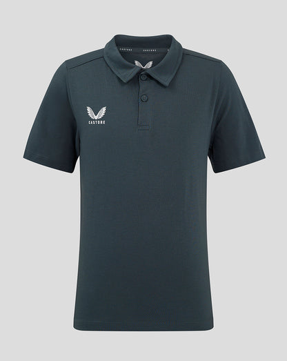 Front view of dark slate junior polo shirt with a white winged crest on the chest