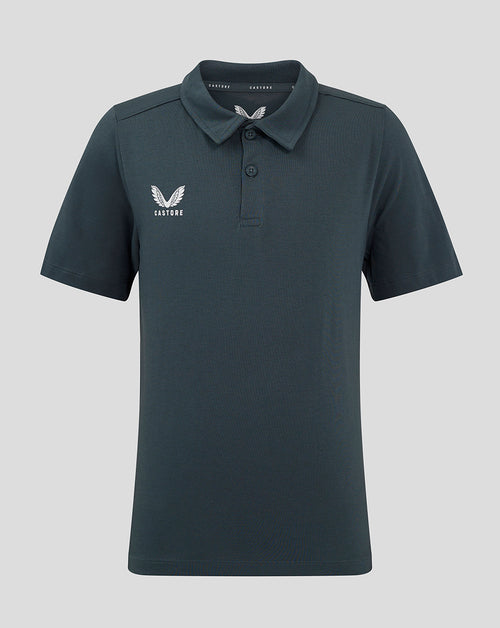 Front view of dark slate junior polo shirt with a white winged crest on the chest