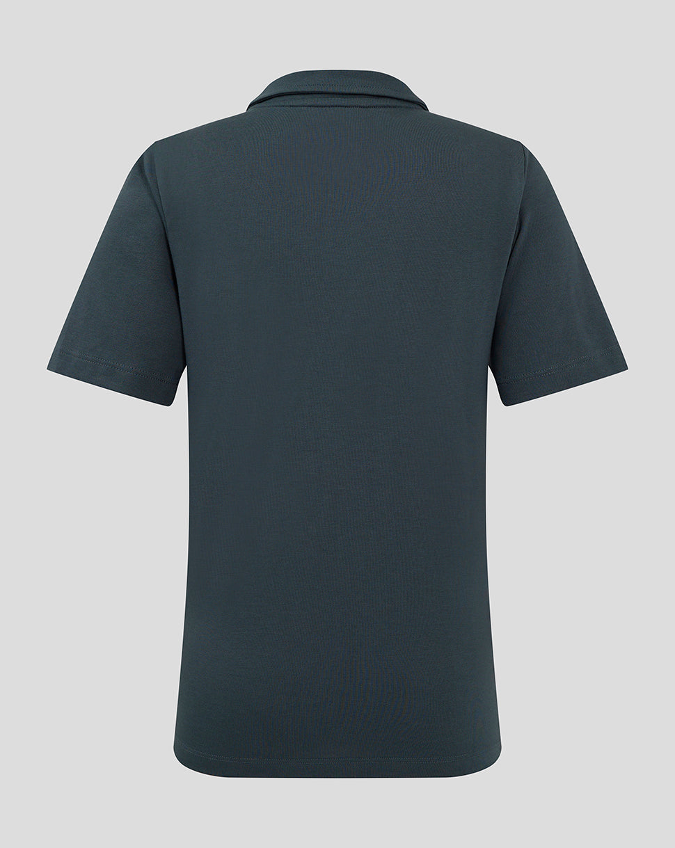 Back view of Junior Polo in dark slate showing collar, short sleeves and straight hem.