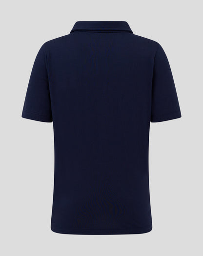 Back view of navy Junior Cotton Leisure Polo showing forward shoulder seam and clean silhouette