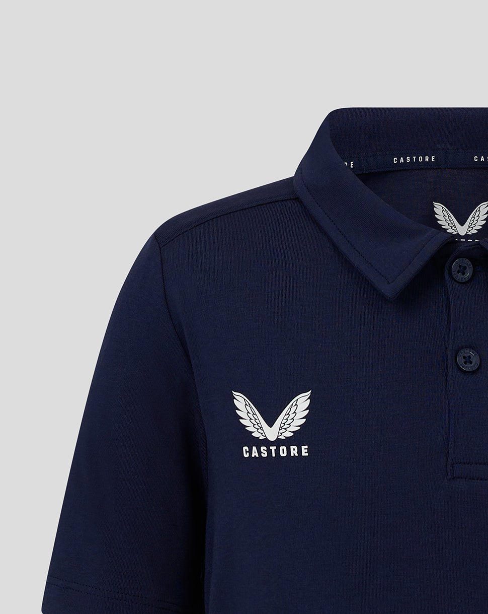 Navy junior polo with Castore logo on left chest and button placket at the collar
