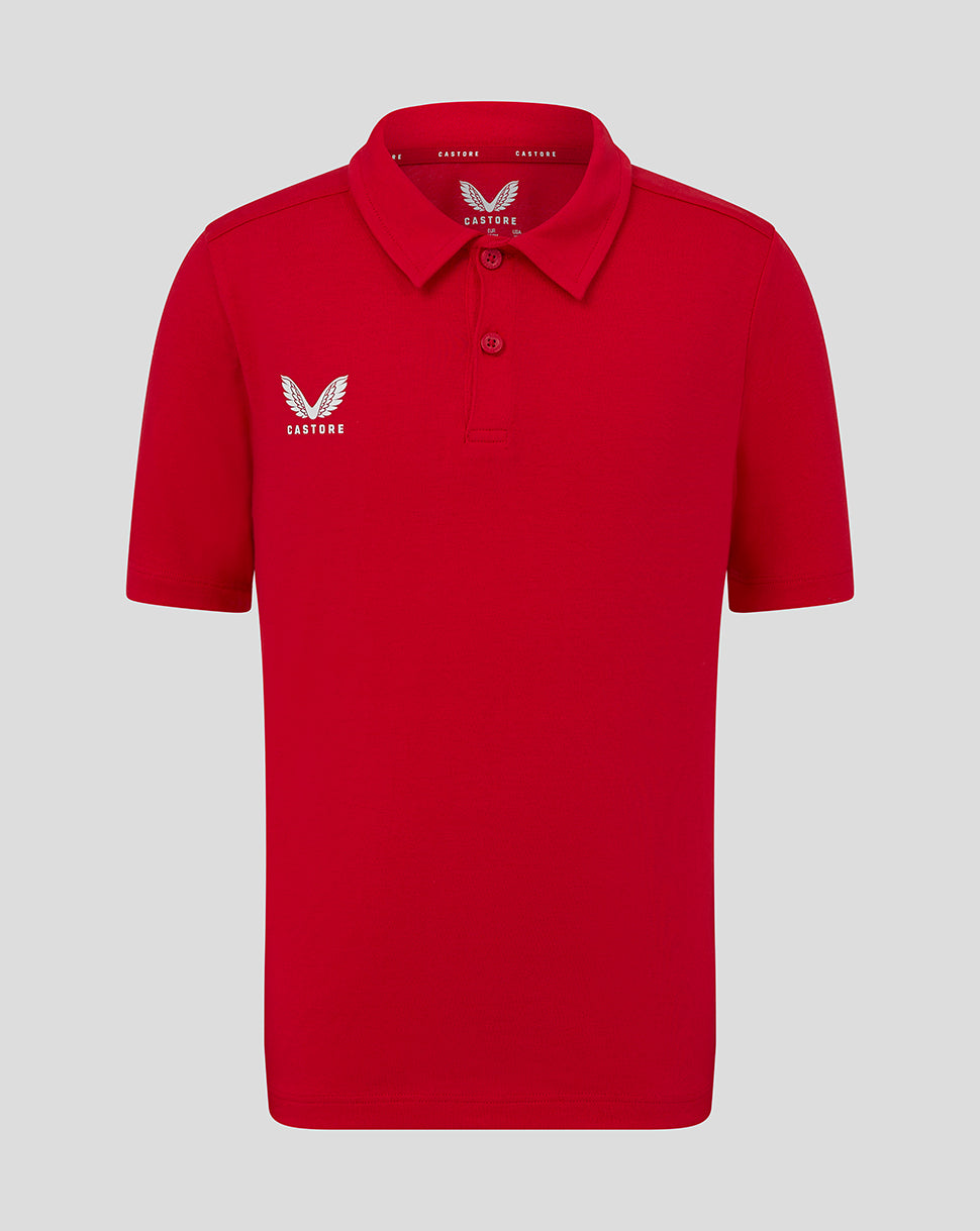 Bright red Junior Cotton Leisure Polo with self fabric collar two button placket and white Castore logo on left chest