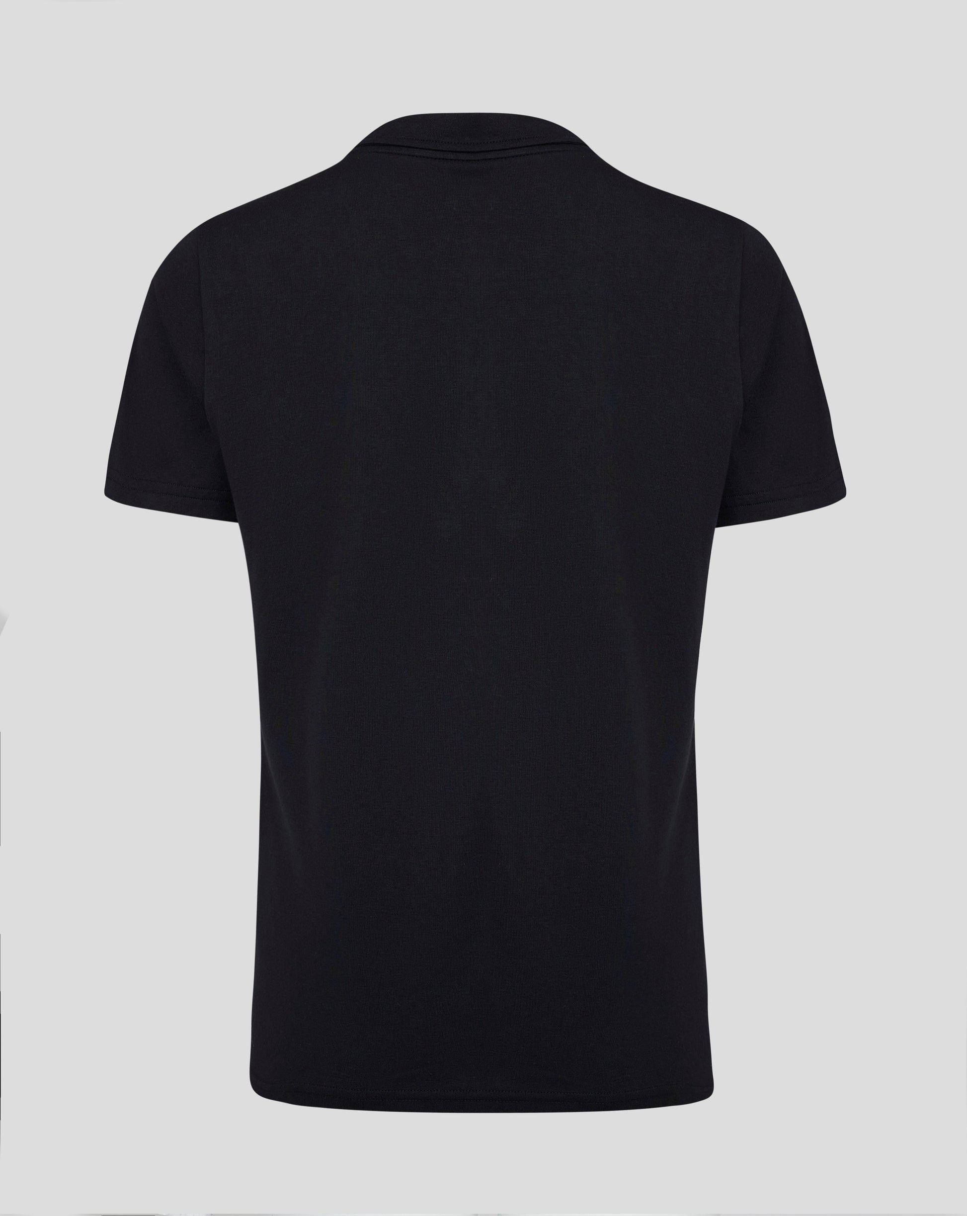 Back view of black Junior Cotton Leisure Polo showing self fabric collar forward shoulder seam and heat sealed Castore logo at the neck