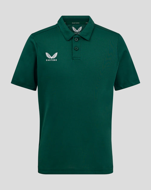 Dark green junior polo with self fabric collar three button placket forward shoulder seam and Castore logo on the chest