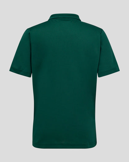 Back view of a dark green junior polo highlighting the collar and shoulder seam