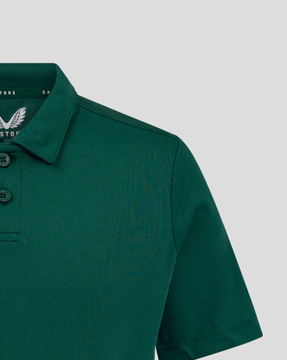 Junior Performance Polo Botanical Garden green close up of collar and shoulder seam with heat sealed Castore logo