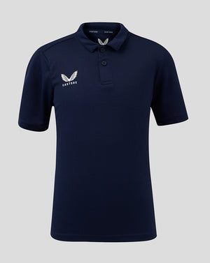 Front view of navy junior performance polo with three button placket and Castore logo on chest