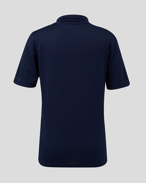 Back view of navy junior performance polo showing collar and short sleeves