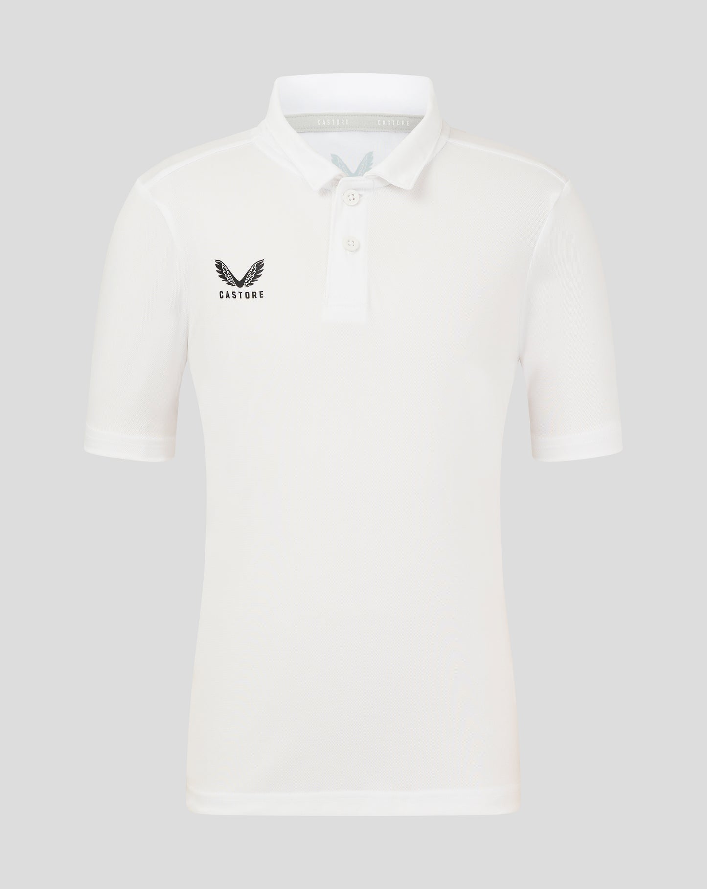 Front view of Brilliant White Junior Performance Polo with three-button placket and left chest wing logo