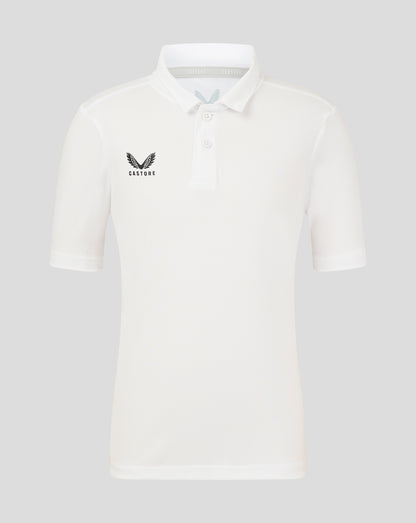 Front view of Brilliant White Junior Performance Polo with three-button placket and left chest wing logo