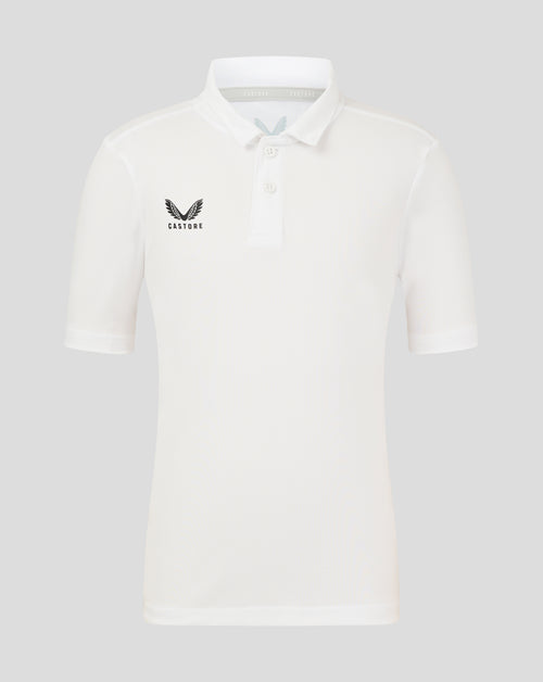 Front view of Brilliant White Junior Performance Polo with three-button placket and left chest wing logo
