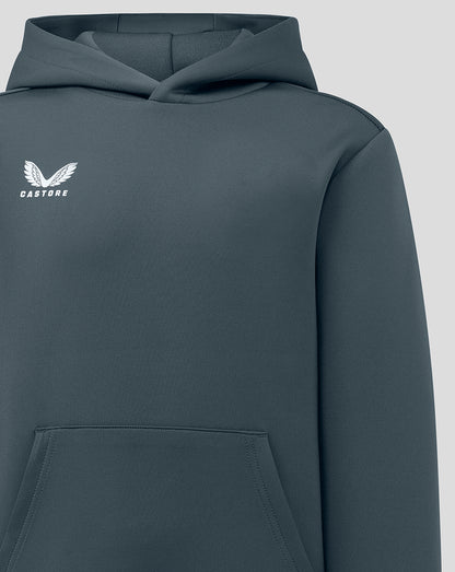 Close-up of the chest area showing the white Castore logo on the dark slate hoody with a front pocket