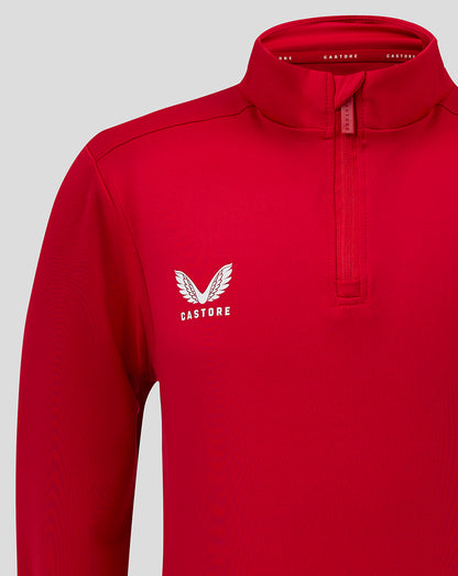 Bright red junior quarter zip top with funnel neck and white Castore wing logo on left chest