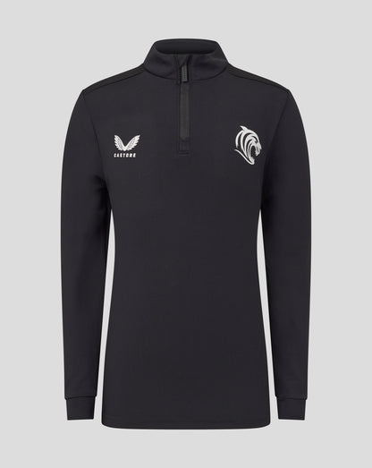 Front view of Leicester Tigers junior training midlayer in black with a zip collar and white Castore wing logo on the left chest and a tiger emblem on the right