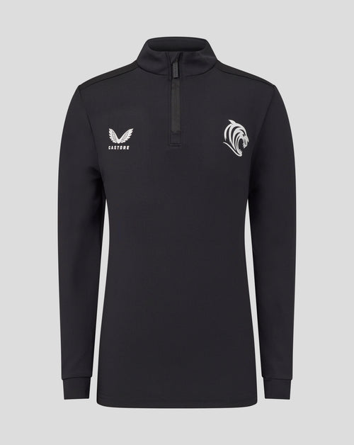Front view of Leicester Tigers junior training midlayer in black with a zip collar and white Castore wing logo on the left chest and a tiger emblem on the right