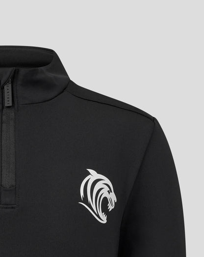 Close-up of a black Leicester Tigers junior training midlayer with a high collar and front zipper