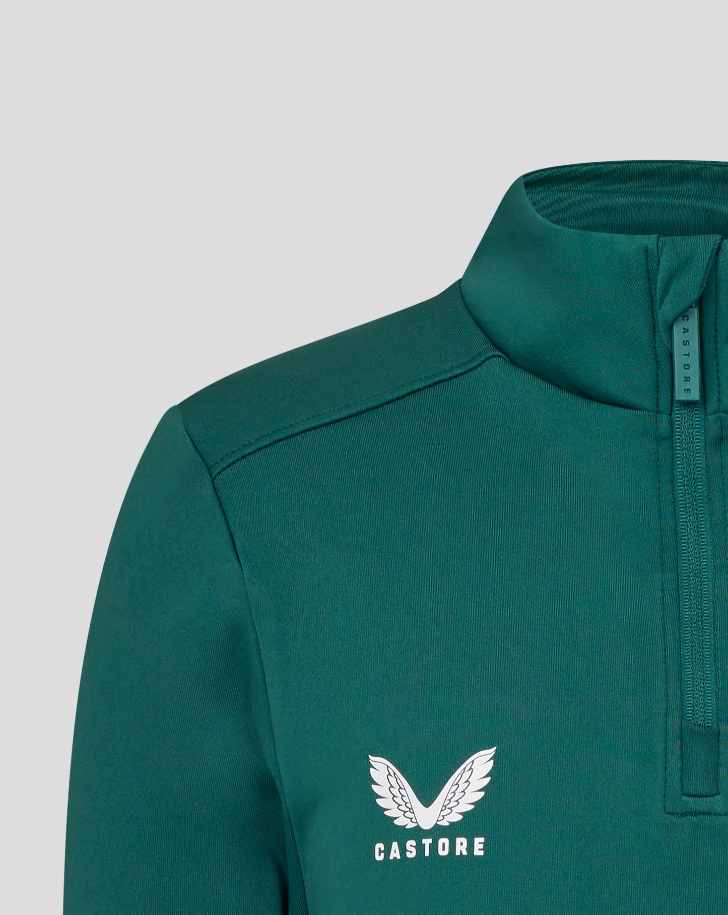 White winged crest and Castore branding on teal Leicester Tigers junior training midlayer.