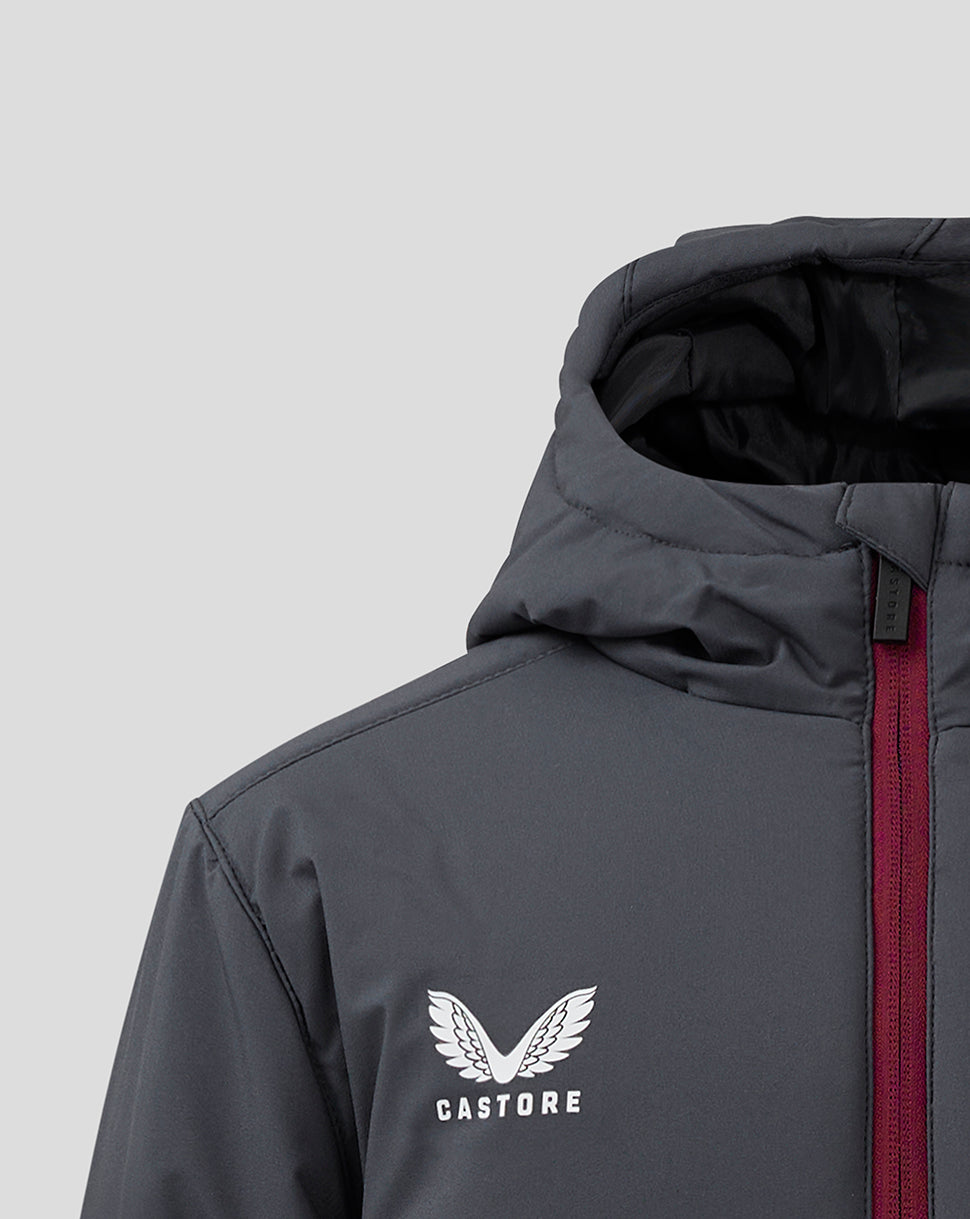 Close up of the chest area showing a burgundy zipper and Castore branding on the jacket