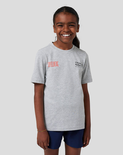 Boy in grey marl Red Bull Racing Spielberg T Shirt with Spielberg graphic and Oracle Red Bull Racing logo on the chest.