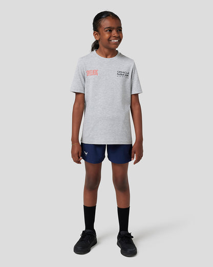 Back view of a child in a grey marl Spielberg T Shirt with large graphic and sponsor text