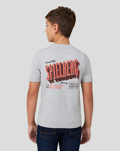 Rear view of a child in a grey marl Spielberg T Shirt showing a bold back print