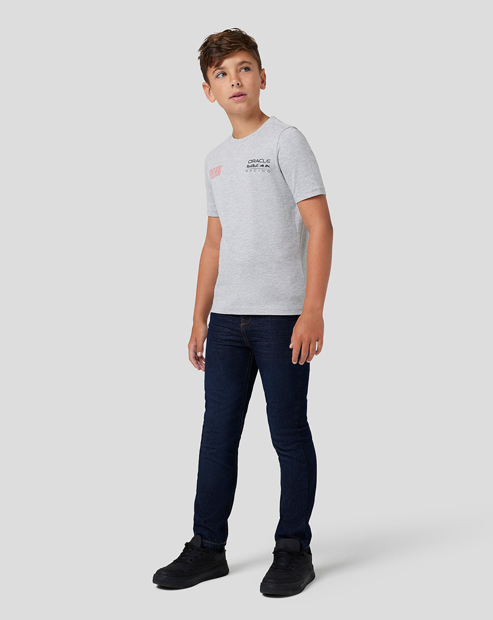 Front view of a young boy wearing a grey marl Red Bull Racing Junior Spielberg T-Shirt with the Oracle Red Bull Racing logo on the chest