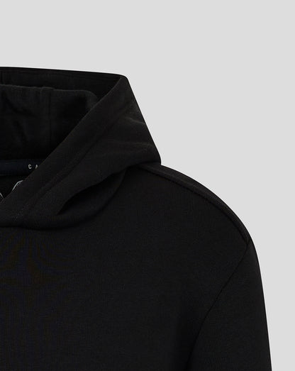 Close up of a black junior cotton hoodie showing the hood and shoulder seam