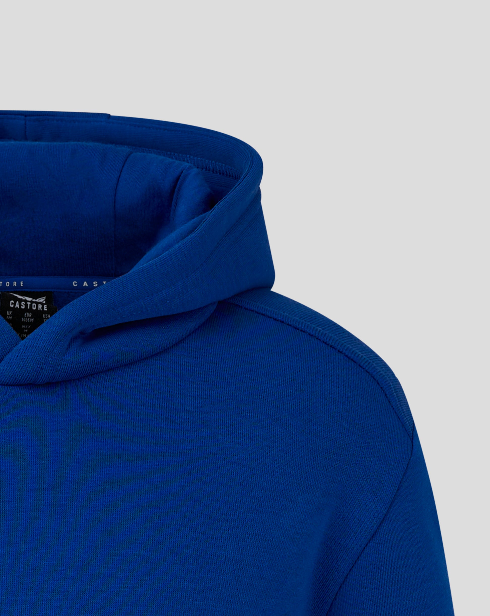 Blue hoodie with white Castore logo and wing emblem on the chest area.