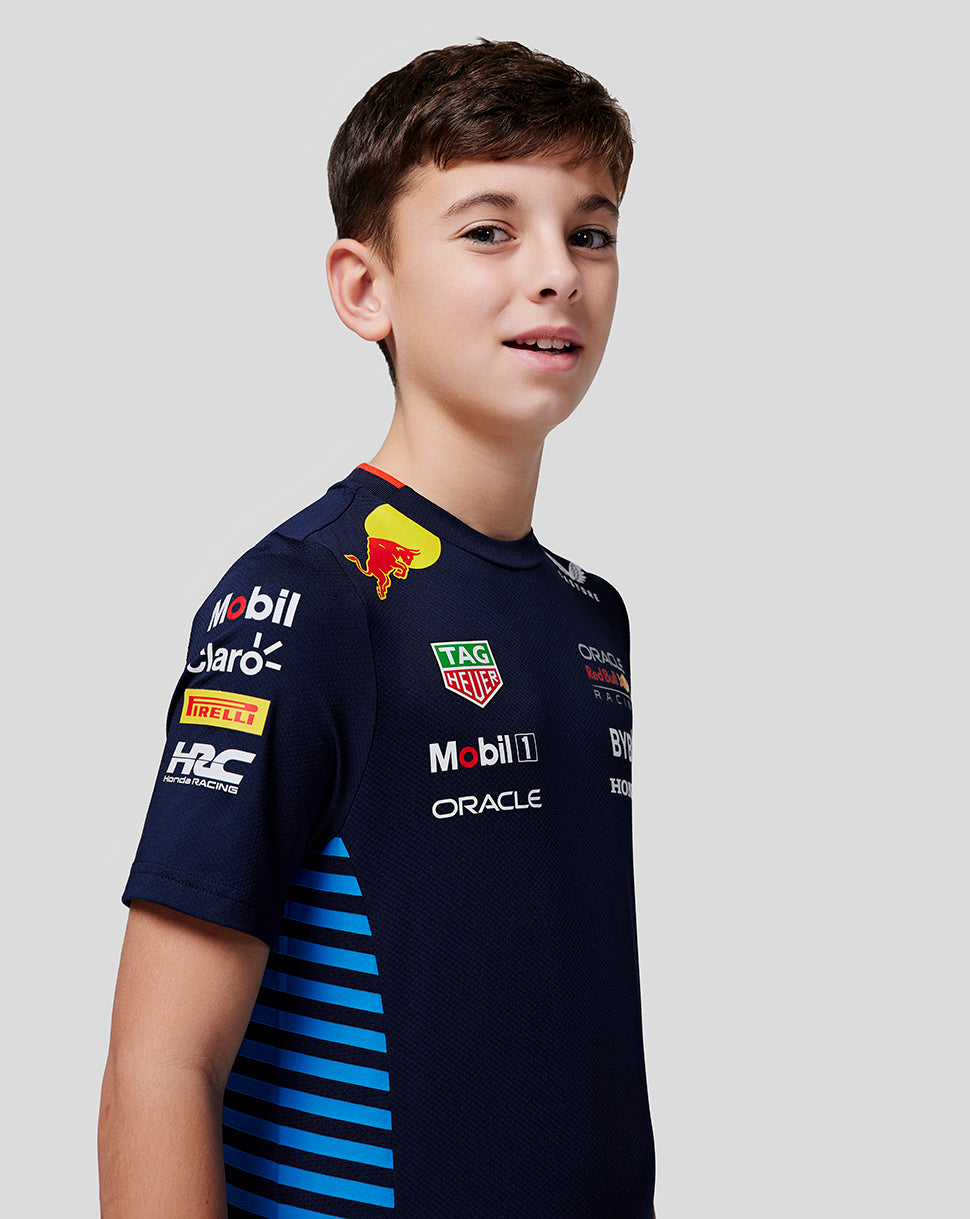 Junior night sky navy Oracle Red Bull Racing Set Up Tee worn by a boy, front view with sponsor logos.