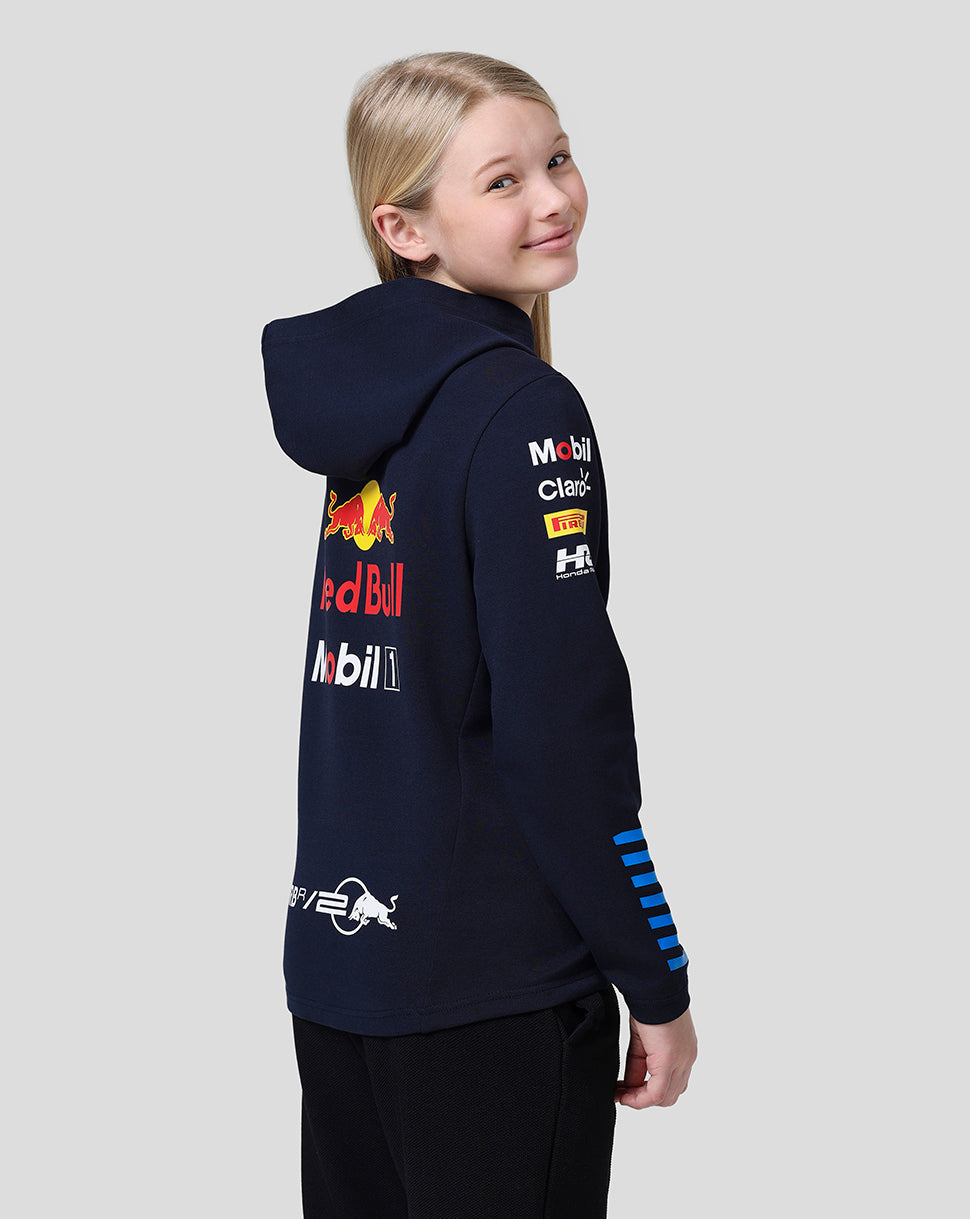 Back view of navy teamline hoodie with large back graphic and sponsor patches on the sleeves.
