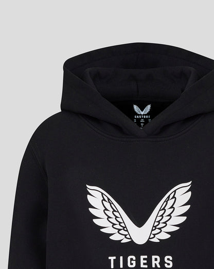 Front view of a black Leicester Tigers junior travel brushed back hoodie with a prominent white wing crest and TIGERS lettering.