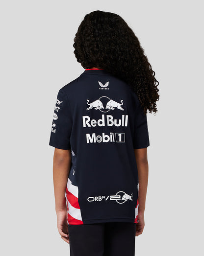 Back view of navy team shirt with bold white Red Bull Mobil 1 logos and a red white striped side panel