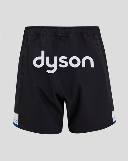 Rear view of Bath Rugby Junior Home Shorts with Dyson branding and a checkered side panel pattern