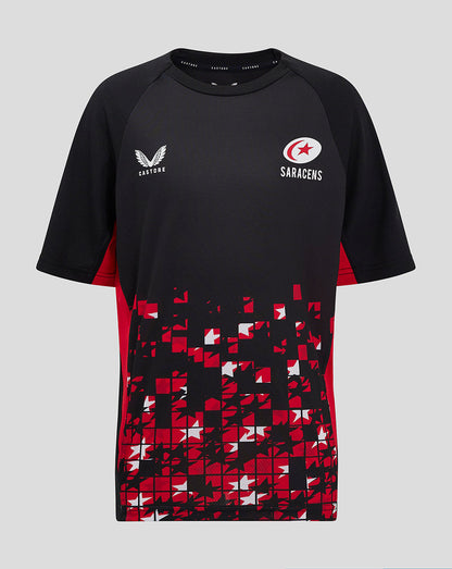 Front view of Saracens Junior 24/25 Matchday tee in black with red panels and pixelated hem pattern, showing the Saracens crest and Castore logo.
