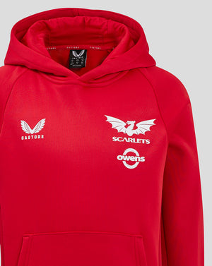 Red Scarlets junior pro players hoody chest close up showing Castore logo on left and Scarlets symbol on right.