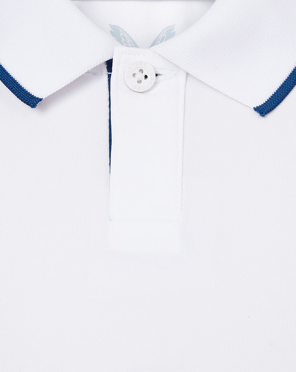 Close up of white infant England cricket shirt collar with blue tipped edges and button placket.