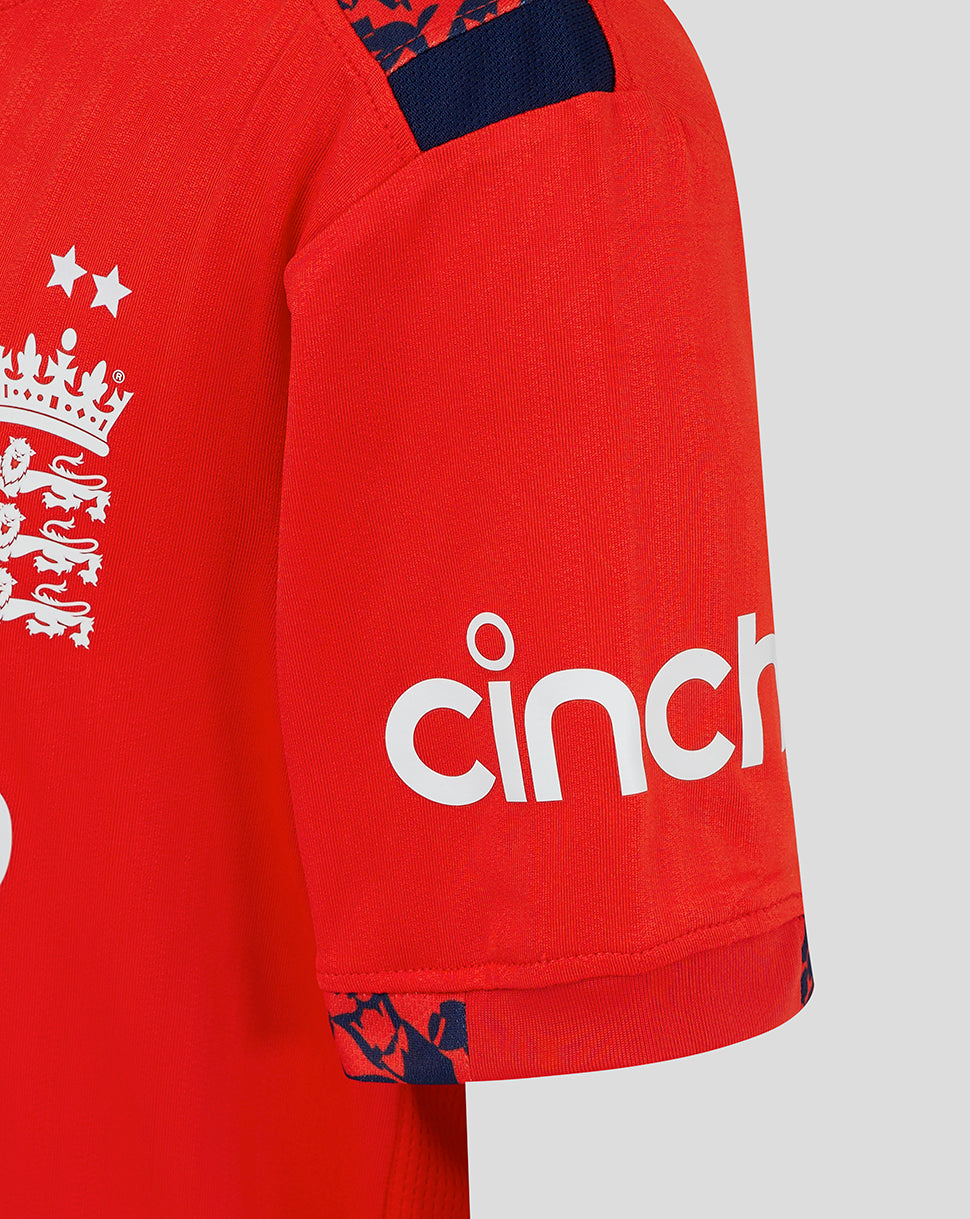 Close-up of sleeve on red England World Cup shirt with Cinch sponsor and blue camo trim.