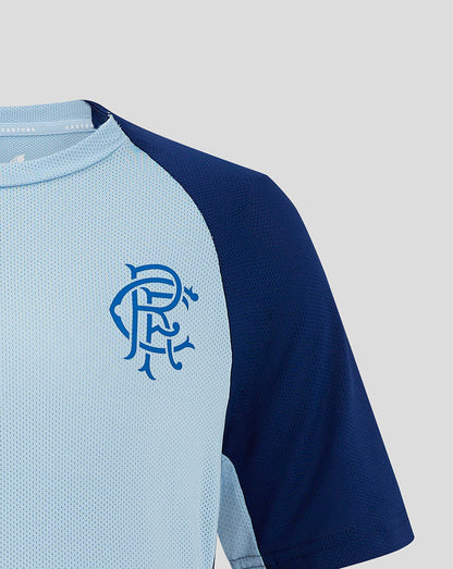 Rangers Junior training shirt front close up featuring light blue body navy sleeves and club crest on the chest