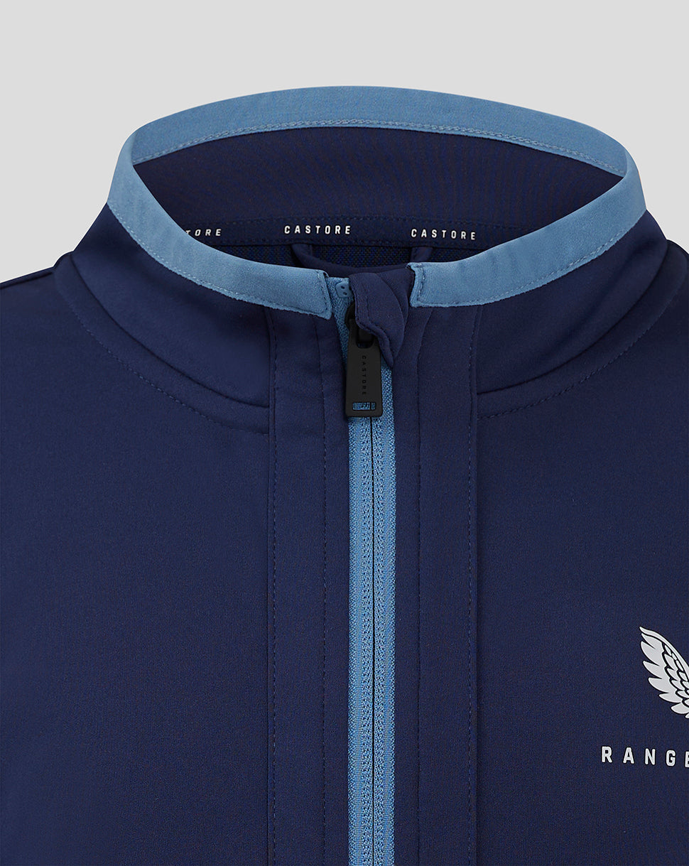 Upper front of navy Rangers FC Travel Jacket showing zip closure and visible crest on the chest