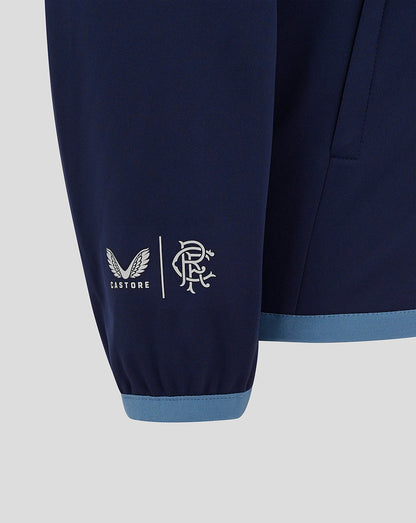 Navy Rangers FC travel jacket sleeve with Castore logo and club crest at the cuff and a light blue hem