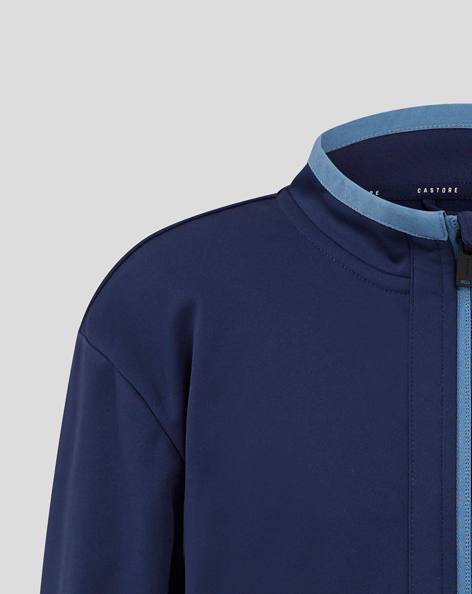 Close up of navy Rangers Junior Travel Softshell Jacket collar with light blue trim.