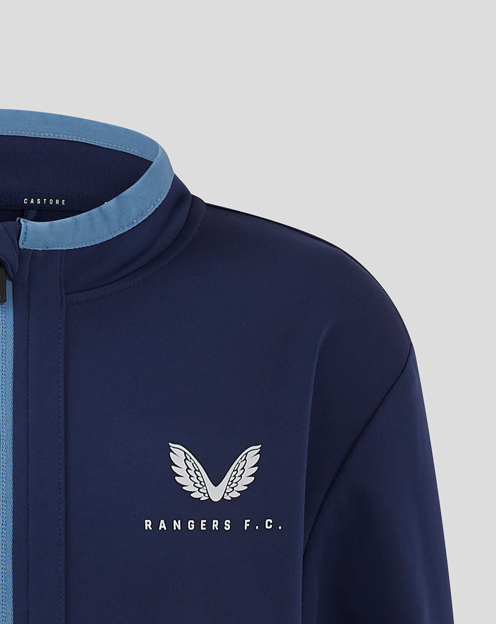 Close up of navy Rangers FC Travel Jacket collar with light blue trim and zip front featuring left chest crest