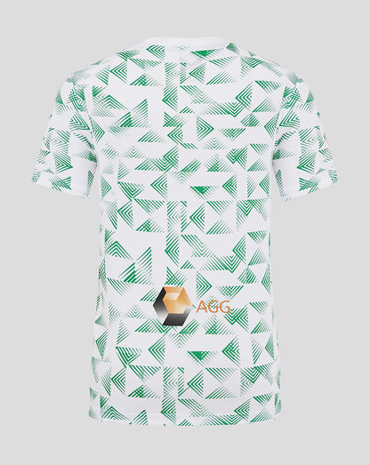 Back view of Mansfield Junior Away Shirt showing all-over green chevron pattern on white fabric