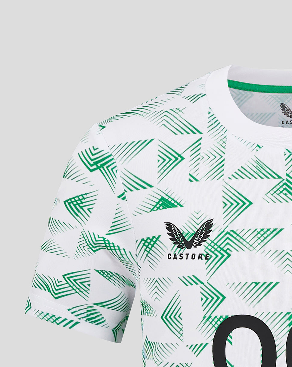 Front close-up of Mansfield Junior Away Shirt with green chevron pattern, two-colour crest left chest and Castore branding right chest
