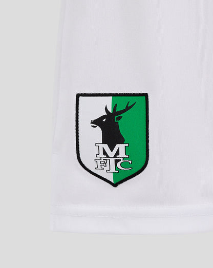 White Mansfield Junior Away Shorts close up of the right thigh shield crest in black white and green